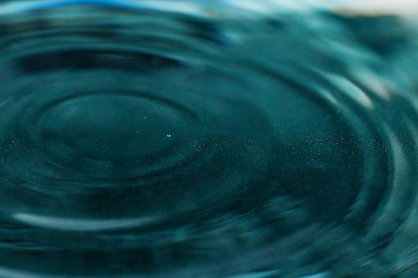 Calm water surface with concentric circles, symbolizing mental clarity.